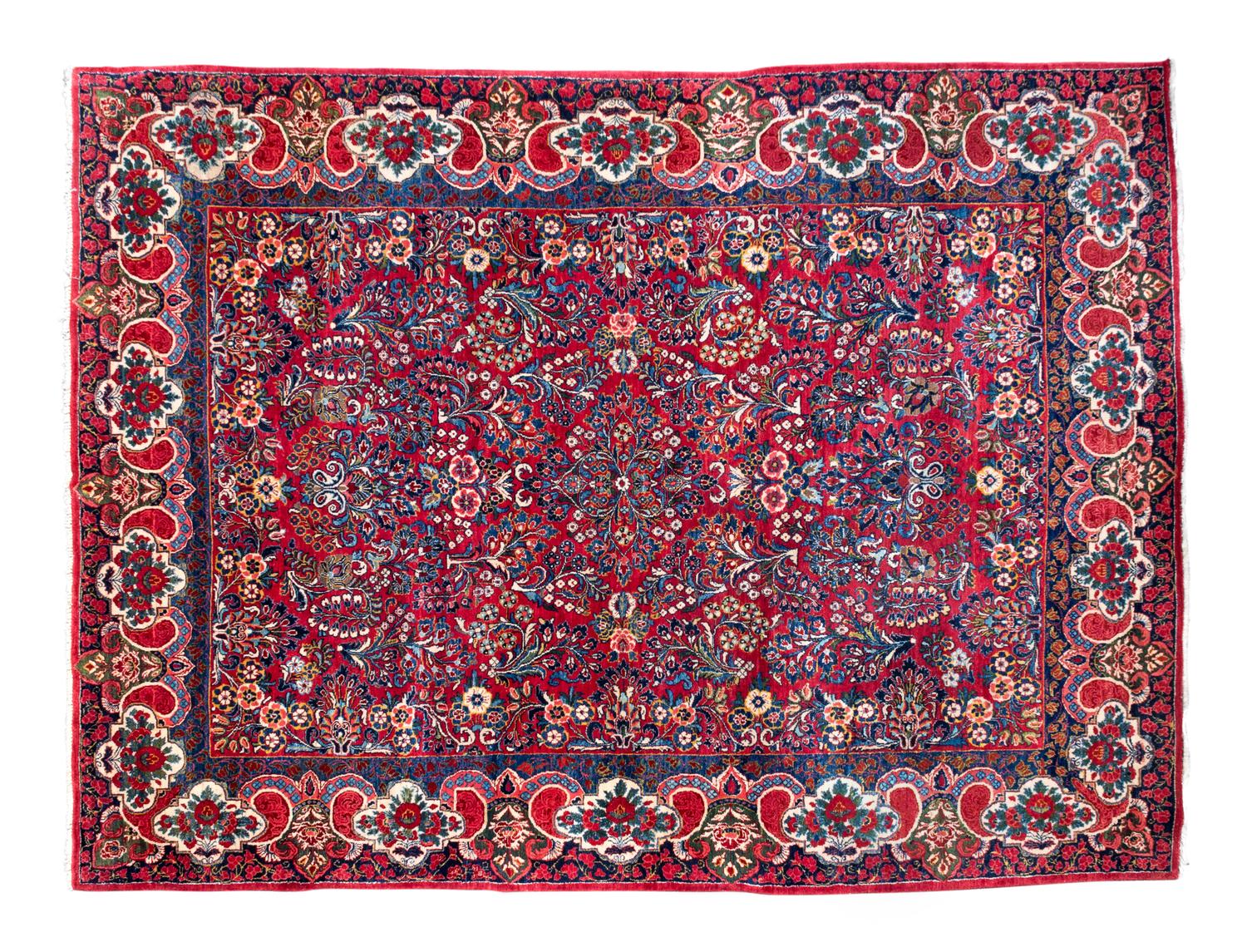 A Sarouk Wool Rug — 20TH CENTURY