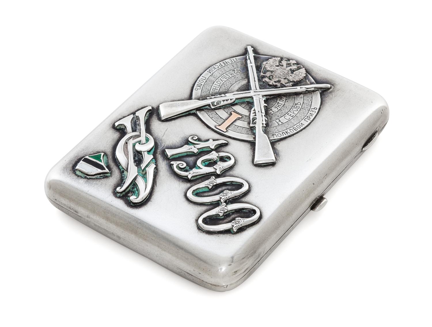 A Russian Silver and Enamel Cigarette Case, Maker's Mark MK, Moscow, Late 19th Century, the case with an applied military insignia, the