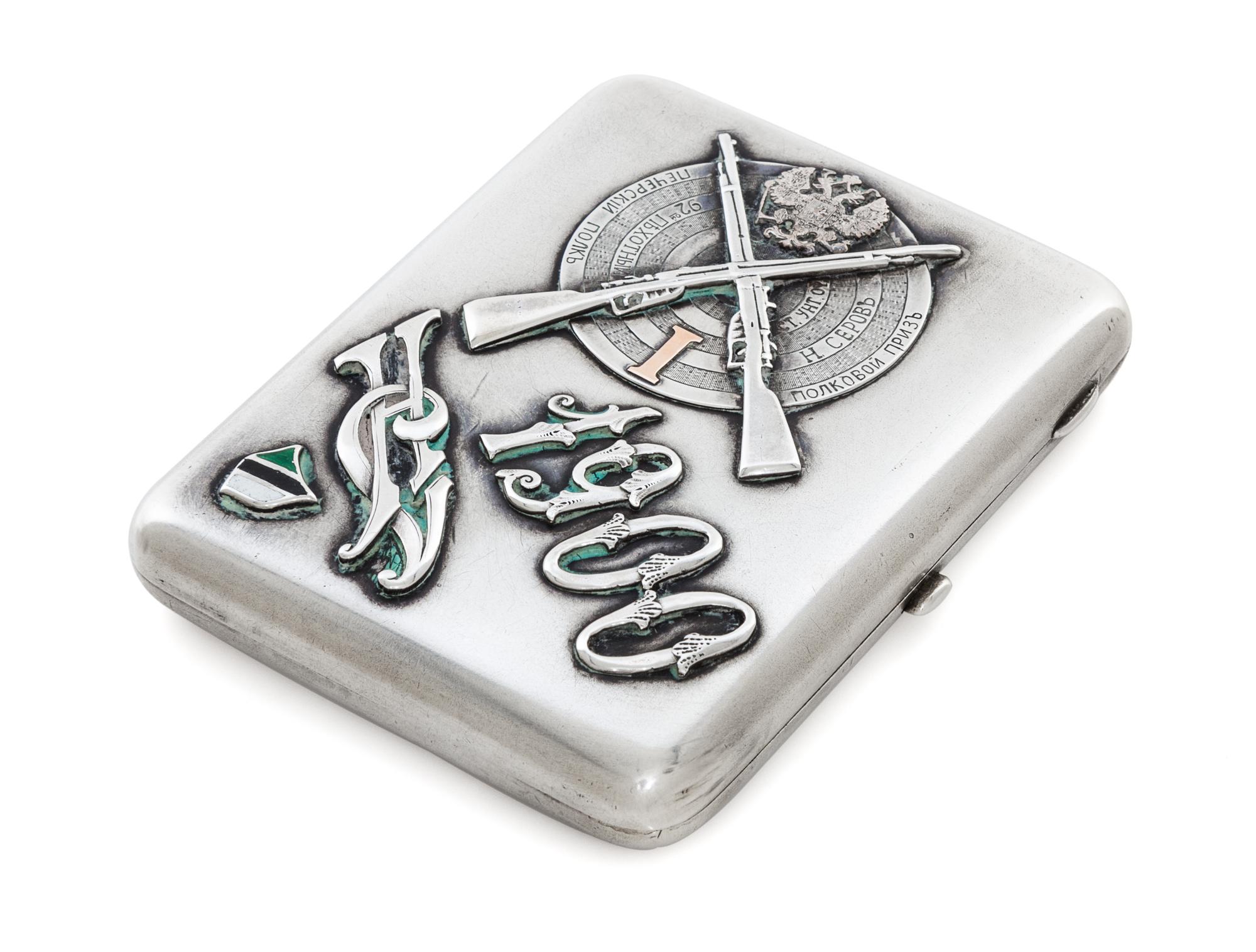 A Russian Silver and Enamel Cigarette Case, Maker's Mark MK, Moscow, Late 19th Century, the case with an applied military insignia, the