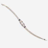 A Platinum, Diamond, and Sapphire Bracelet Art Deco, c.1920