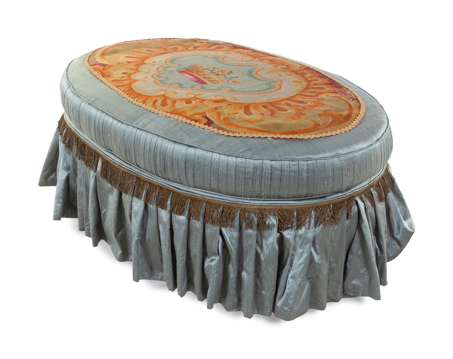 A French Needlepoint Upholstered Ottoman