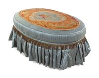 A French Needlepoint Upholstered Ottoman