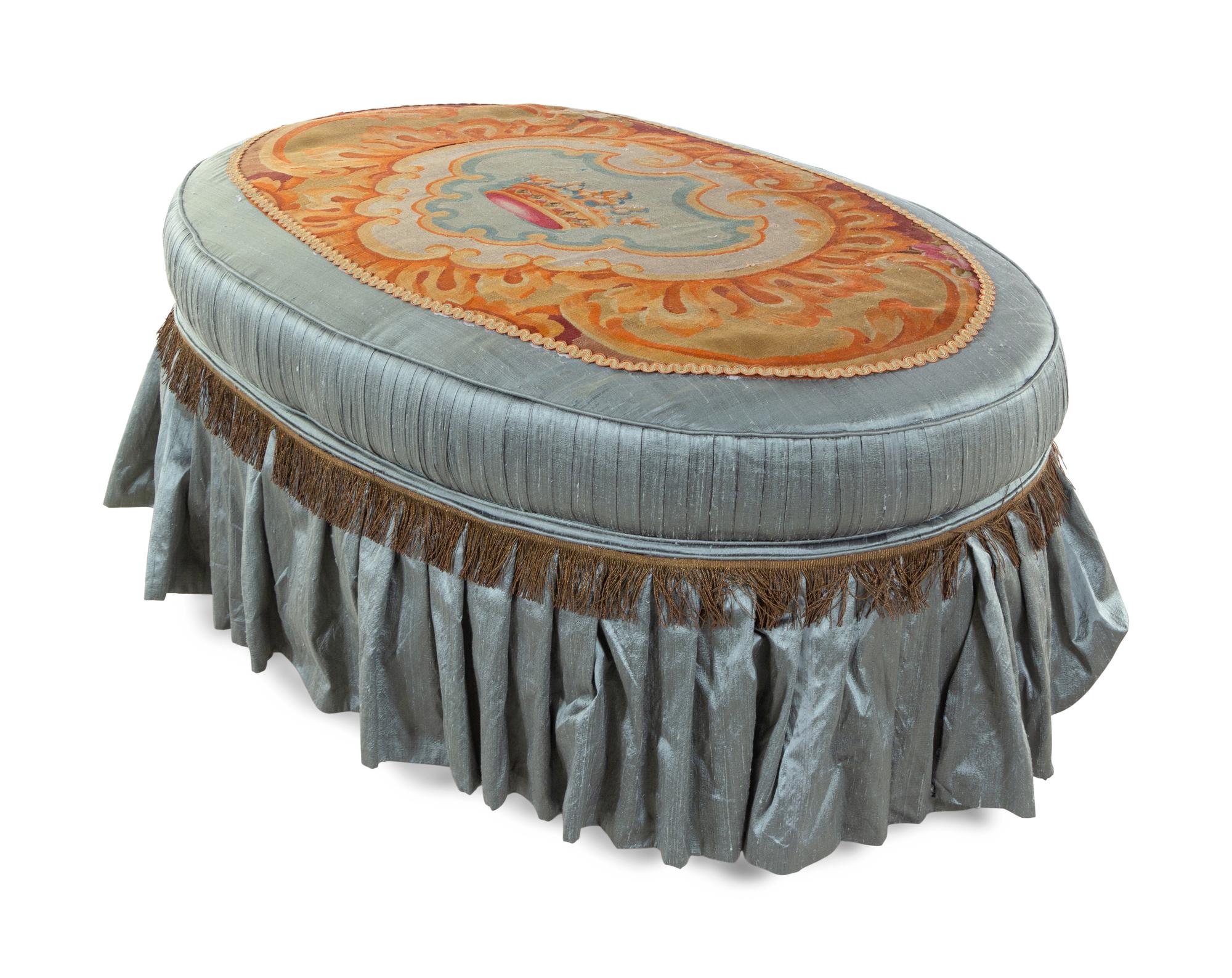 A French Needlepoint Upholstered Ottoman