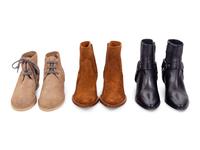 Three Pairs of Designer Boots: Two Saint Laurent, One Chanel