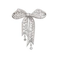PLATINUM AND DIAMOND BOW BROOCH