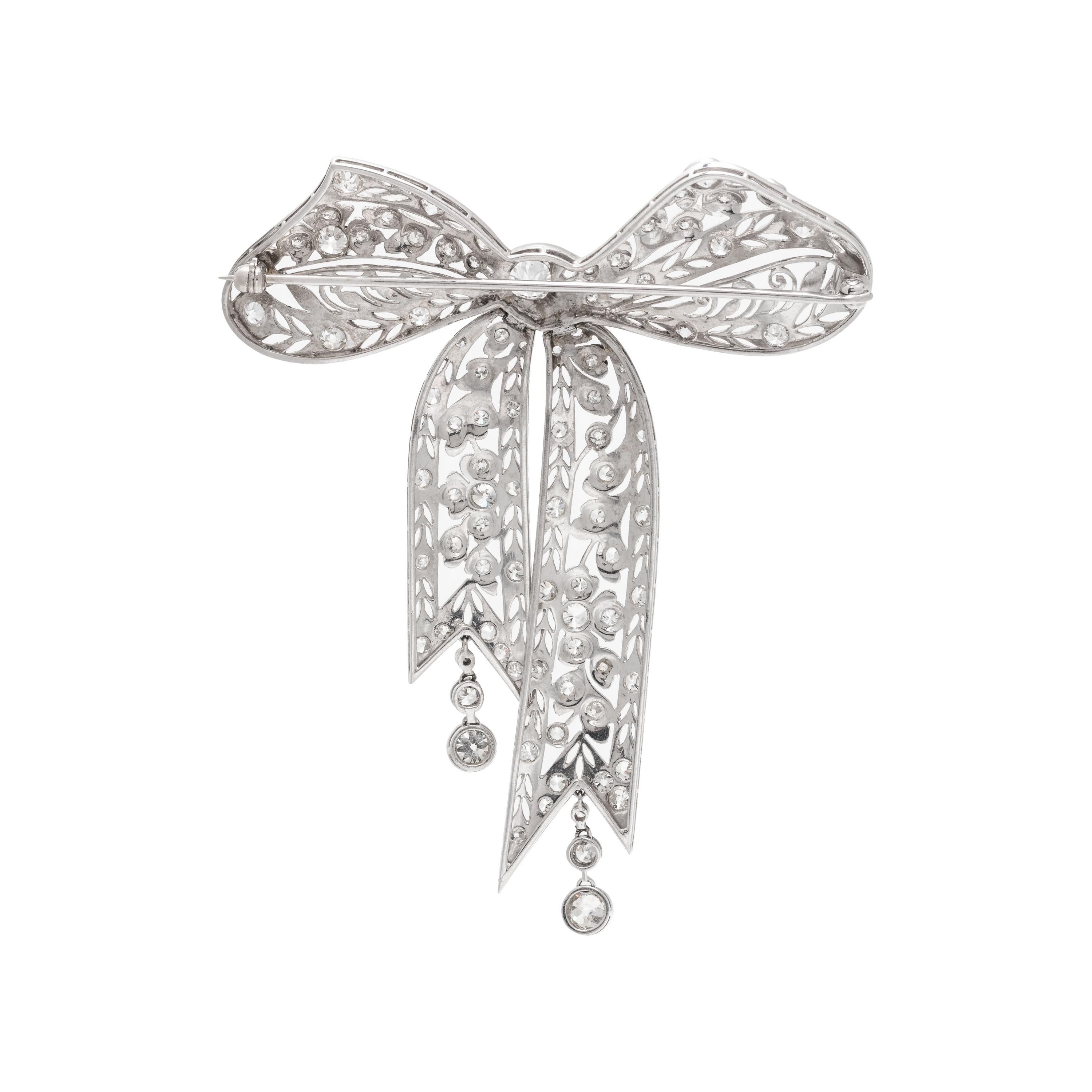 PLATINUM AND DIAMOND BOW BROOCH
