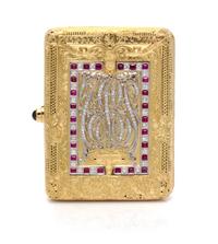 An 18 Karat Yellow Gold, Platinum, Ruby, Diamond and Sapphire Compact, 102.90 dwts.