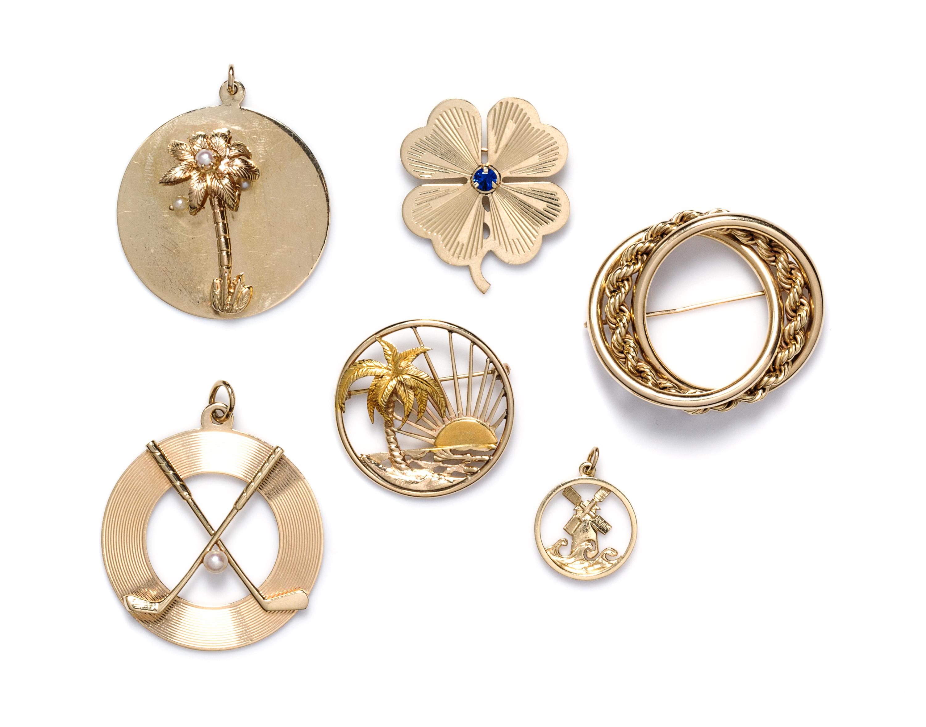 A Collection of 14 Karat Yellow Gold and Gemstone Pendants, 33.20 dwts.