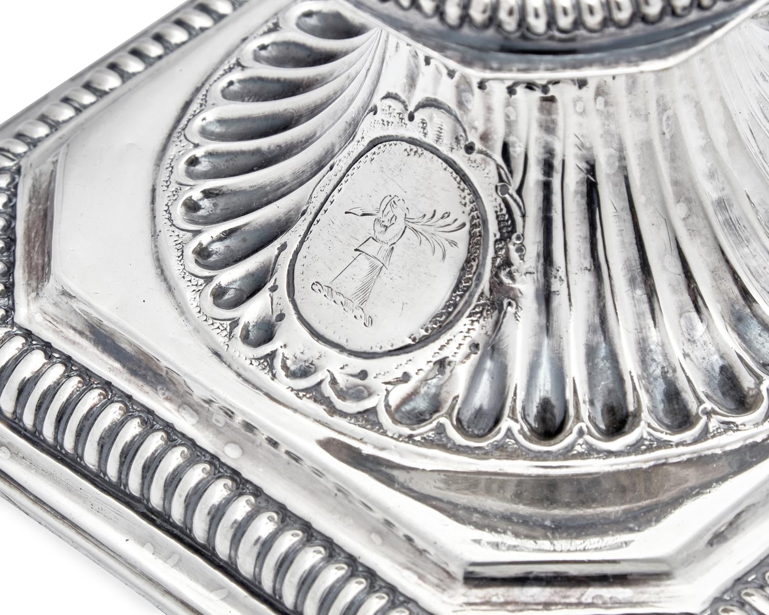 A Rare Pair of William III Britannia Silver Candlesticks