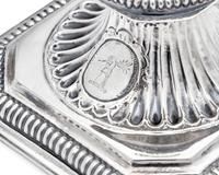 A Rare Pair of William III Britannia Silver Candlesticks