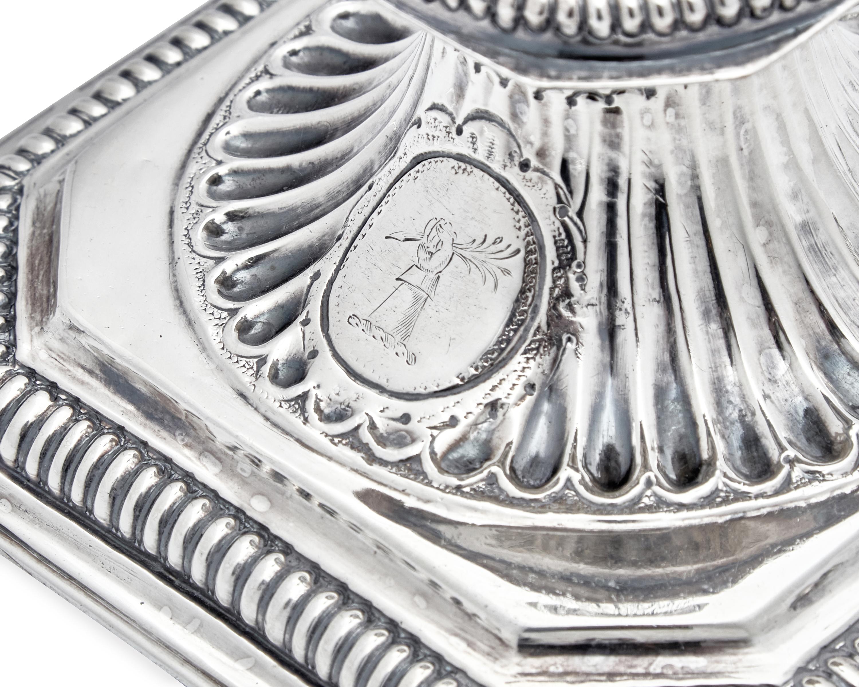 A Rare Pair of William III Britannia Silver Candlesticks