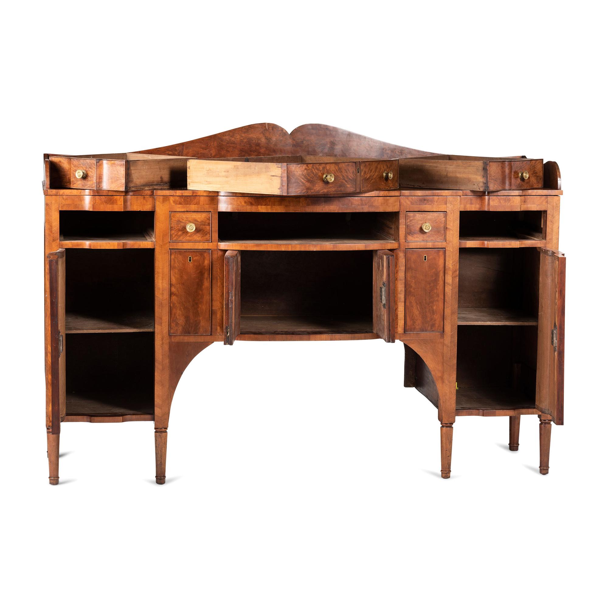 A Classical Highly Figured Cherrywood Scallop-Front Sideboard