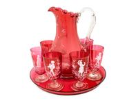 A Mary Gregory Style White-Enameled Ruby Glass Drinks Set — EARLY 20TH CENTURY