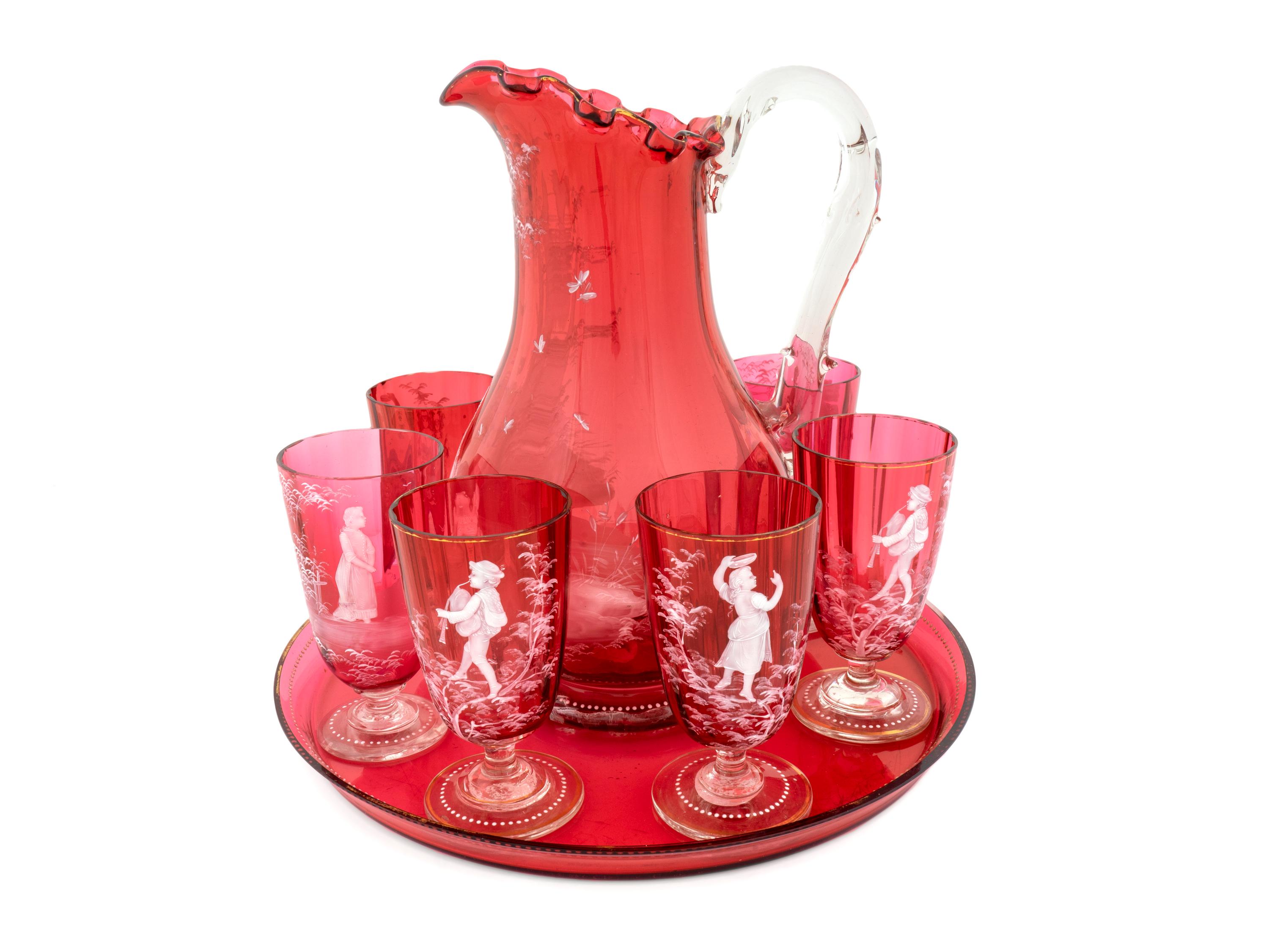 A Mary Gregory Style White-Enameled Ruby Glass Drinks Set — EARLY 20TH CENTURY