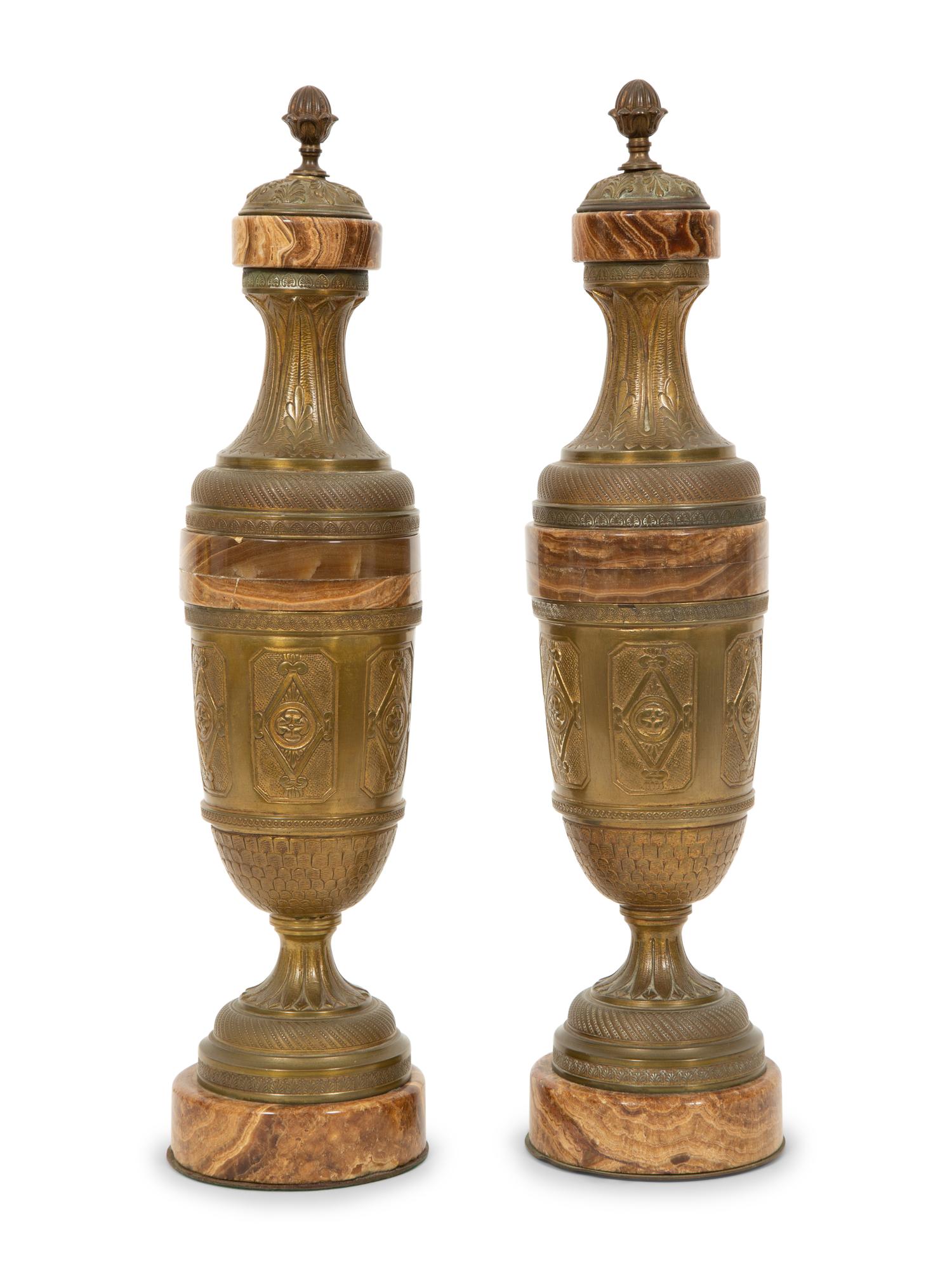 A Pair of Continental Gilt Bronze and Onyx Urns