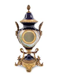 A Gilt Bronze Mounted Sèvres Style Porcelain Urn-Form Clock