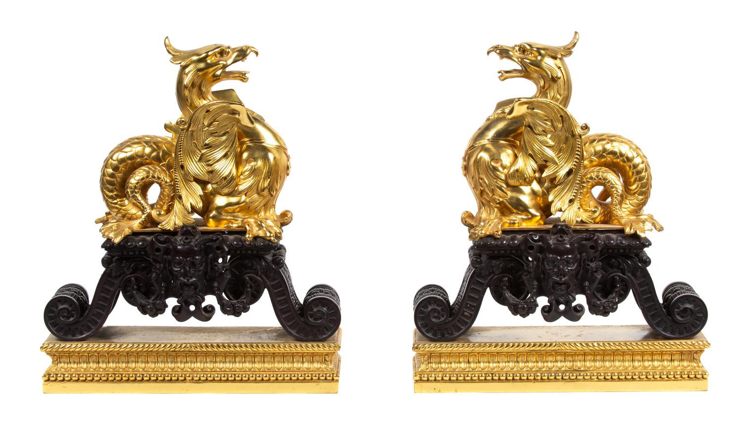 A Pair of French Parcel-Gilt and Patinated Bronze Dragon-Form Chenets Height 20 x width 16 1/2 inches. — LATE 19TH CENTURY/EARLY 20TH CENTURY