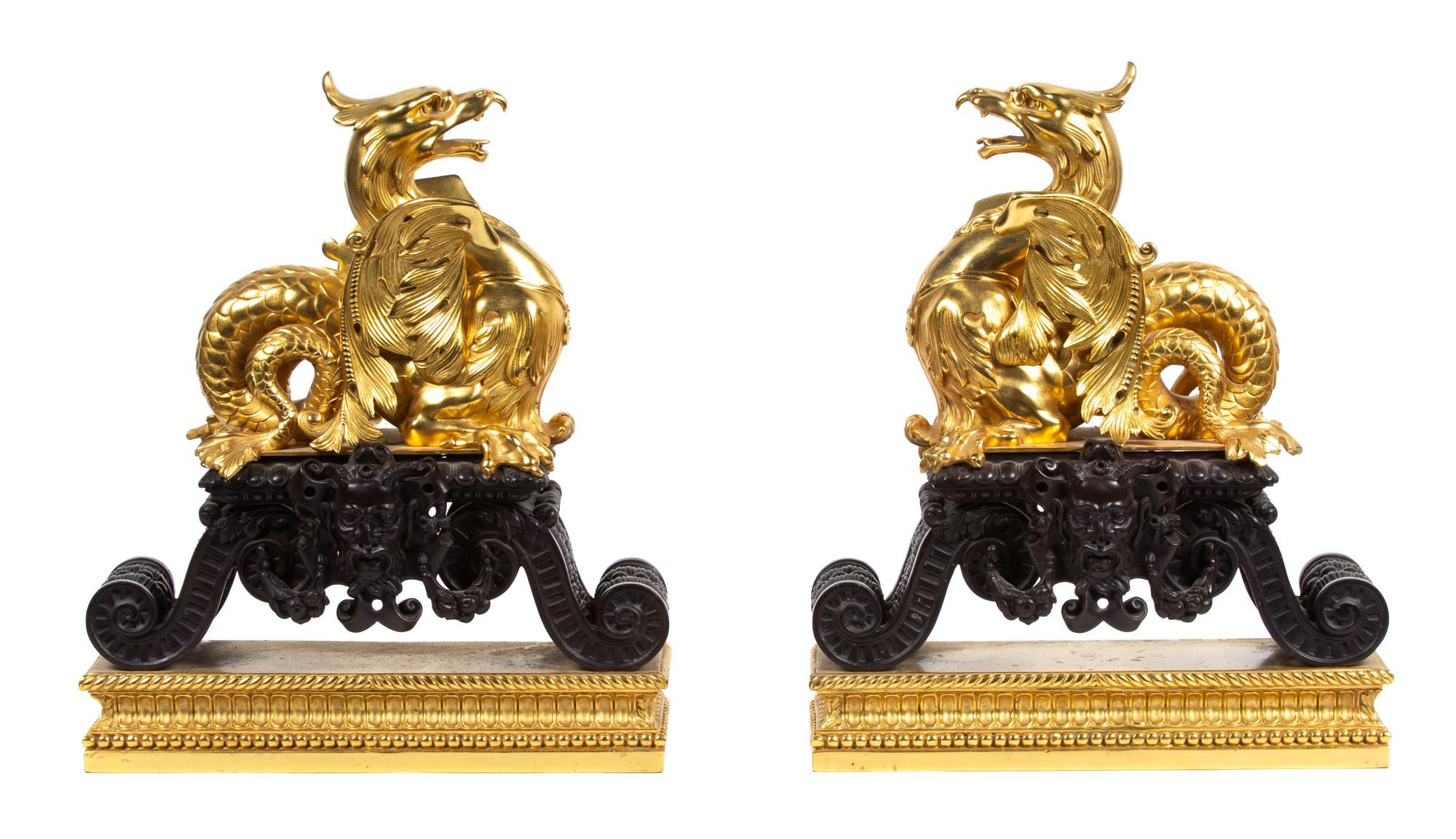 A Pair of French Parcel-Gilt and Patinated Bronze Dragon-Form Chenets Height 20 x width 16 1/2 inches. — LATE 19TH CENTURY/EARLY 20TH CENTURY