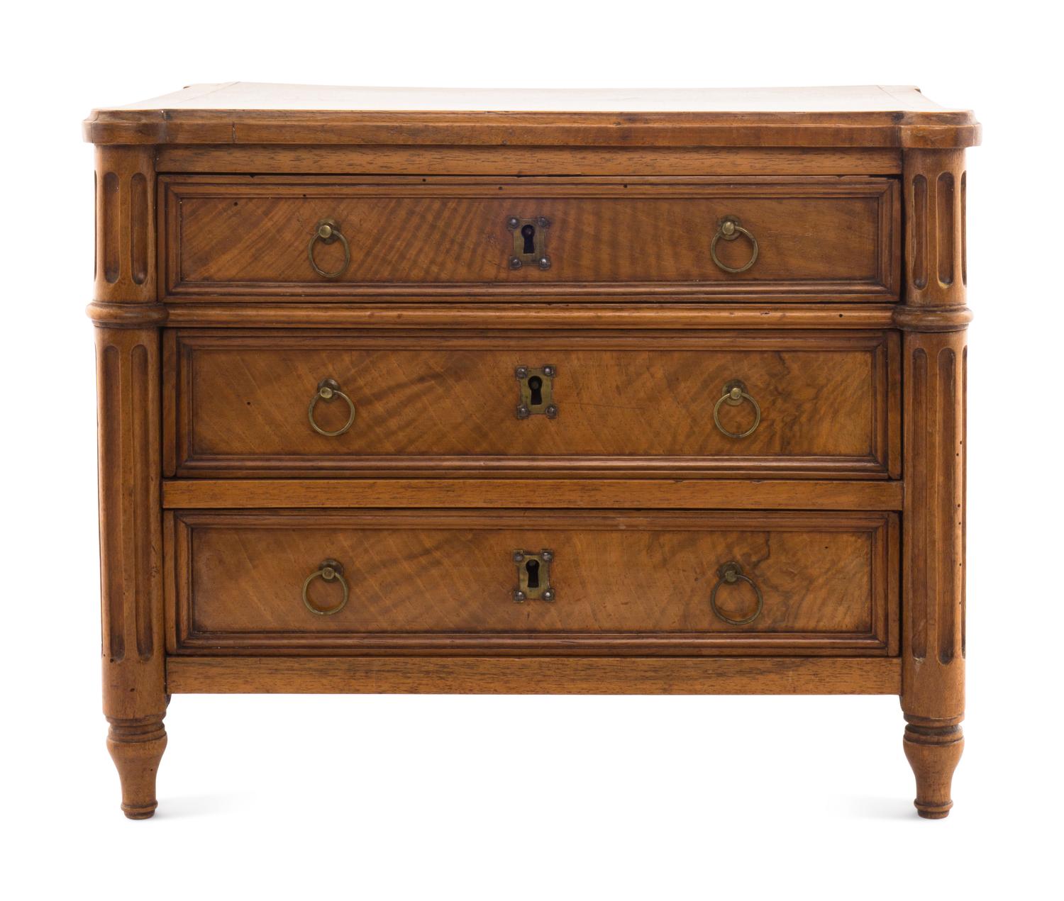 A Louis XVI Style Walnut Diminutive Commode