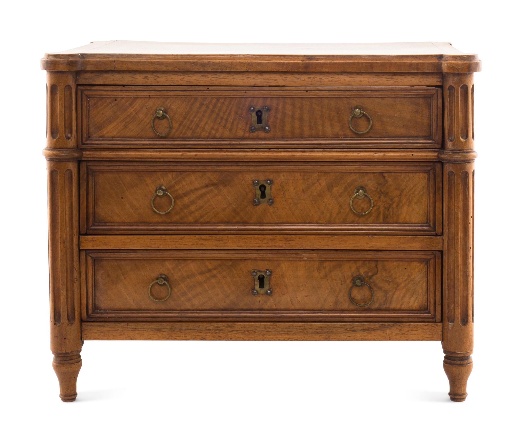 A Louis XVI Style Walnut Diminutive Commode