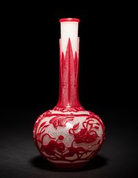 A Chinese Red Overlay Snowflake Ground Peking Glass Bottle Vase