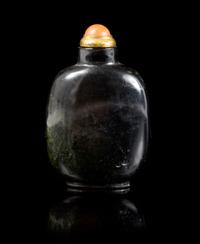 A Black Jade Snuff Bottle Height 3 1/2 inches.