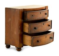A Regency Mahogany Diminutive Bowfront Chest of Drawers