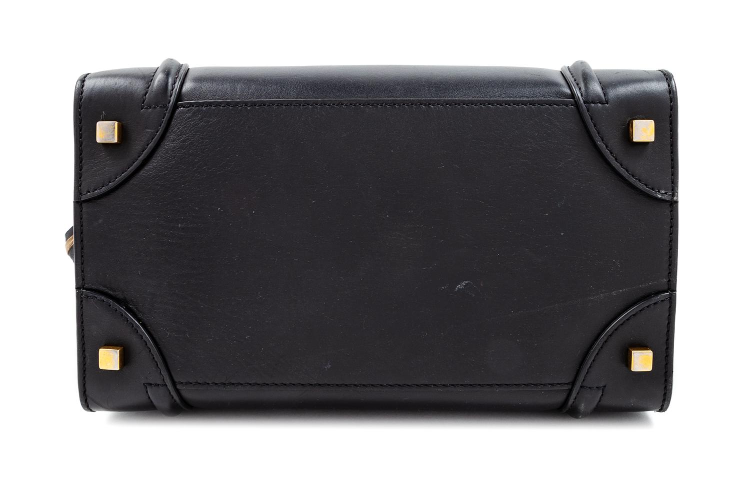 A Celine Black Smooth Leather Luggage Tote Bag, 12" H x 12" W x 7" D; Handle drop: 6".