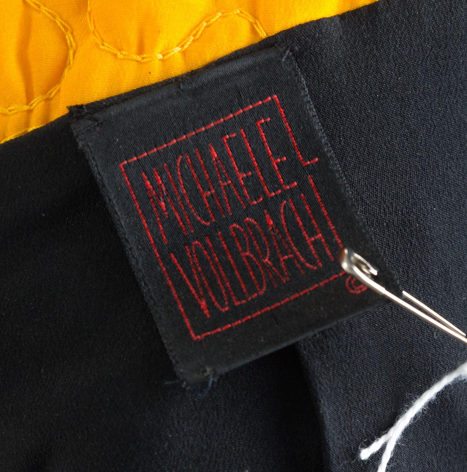 A Michaele Vollbracht Yellow Quilted Cat Jacket and Black Gown, Jacket size 10; Dress no size.