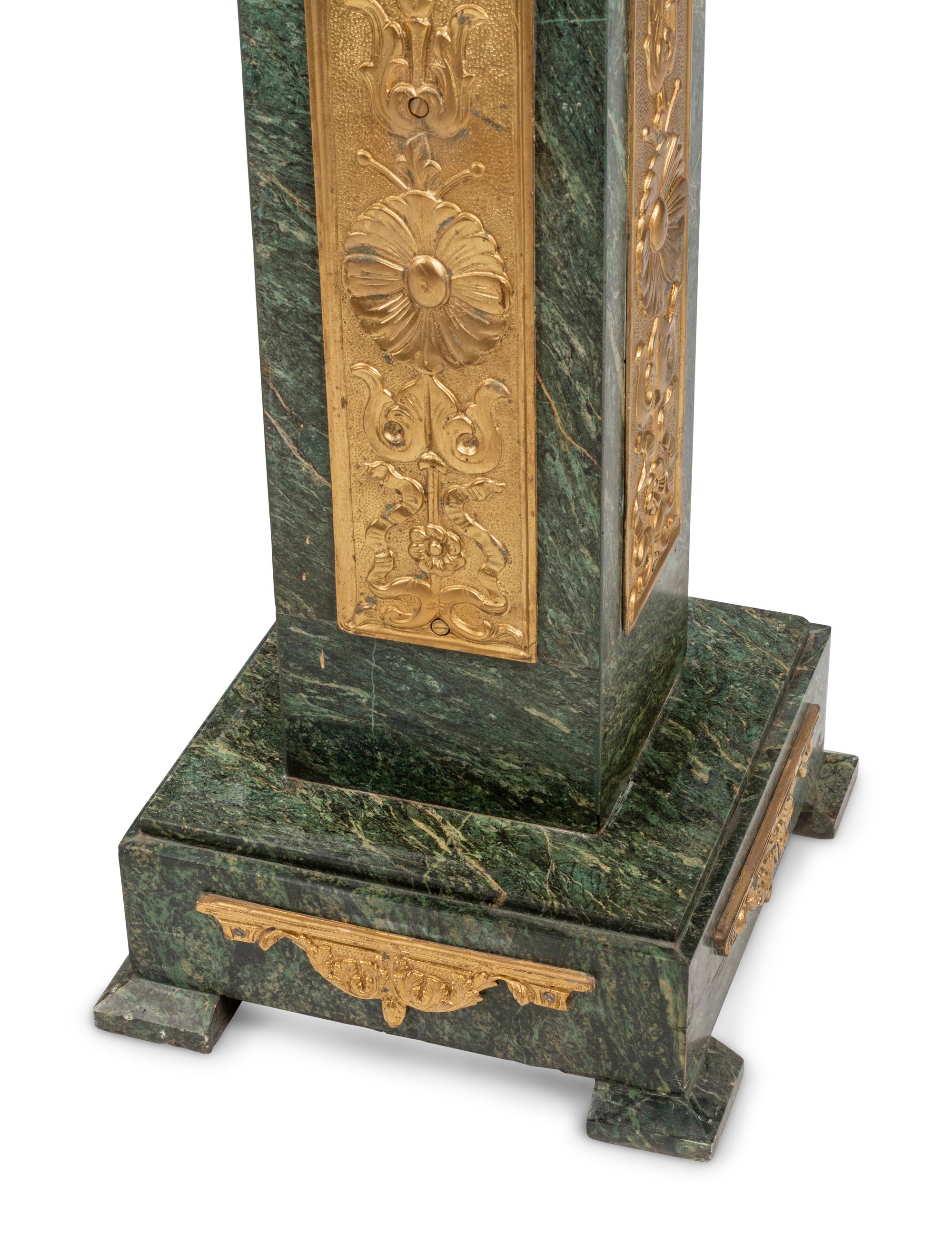 A Pair of Gilt Bronze Mounted Marble Pedestals