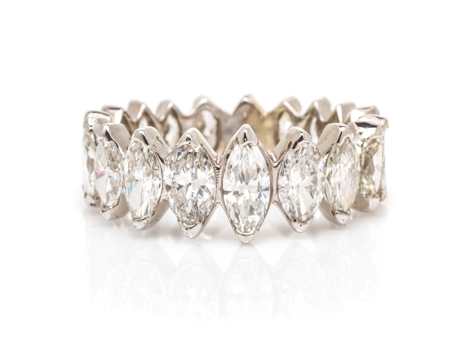 A Graduated Platinum and Diamond Eternity Band, 3.20 dwts.