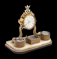 A Gilt Metal and Onyx Nautical Desk Clock, with Compass and Barometer