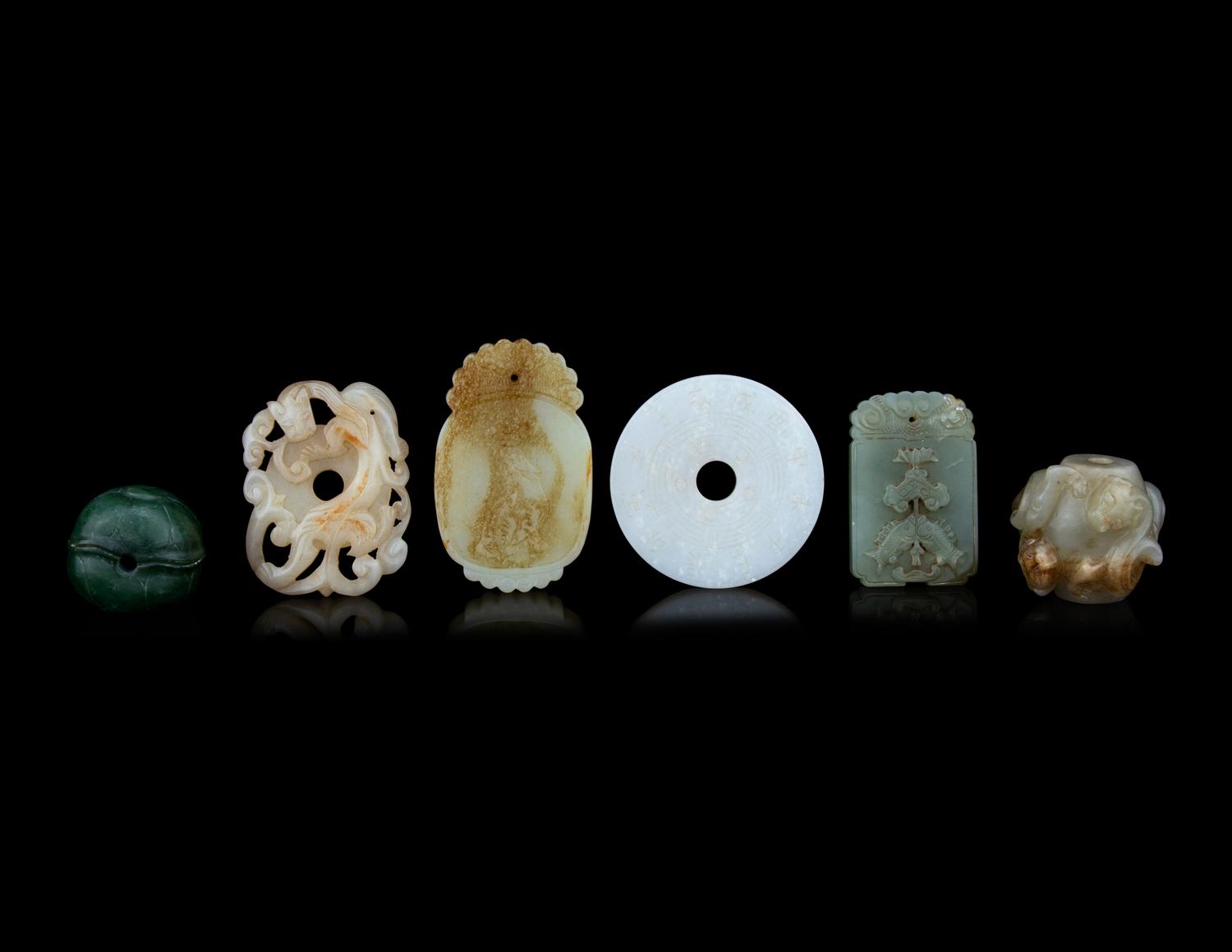 Six Chinese Carved Jade and Hardstone Pendants