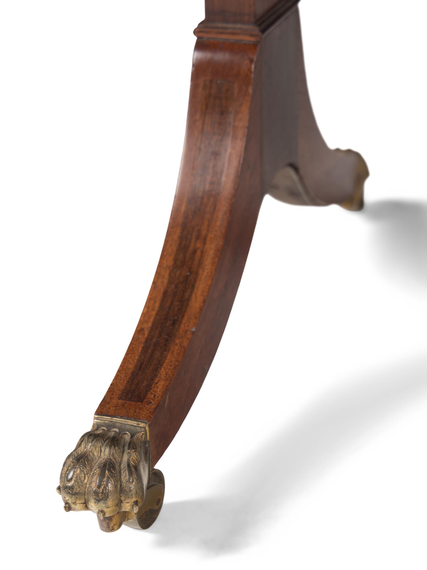 A Regency Rosewood and Mahogany Sofa Table
