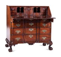 A Chippendale Carved and Figured Mahogany Block-Front Slant-Front Desk