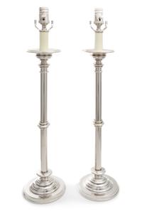 A Pair of Polished Metal Table Lamps Height 28 1/4 inches.