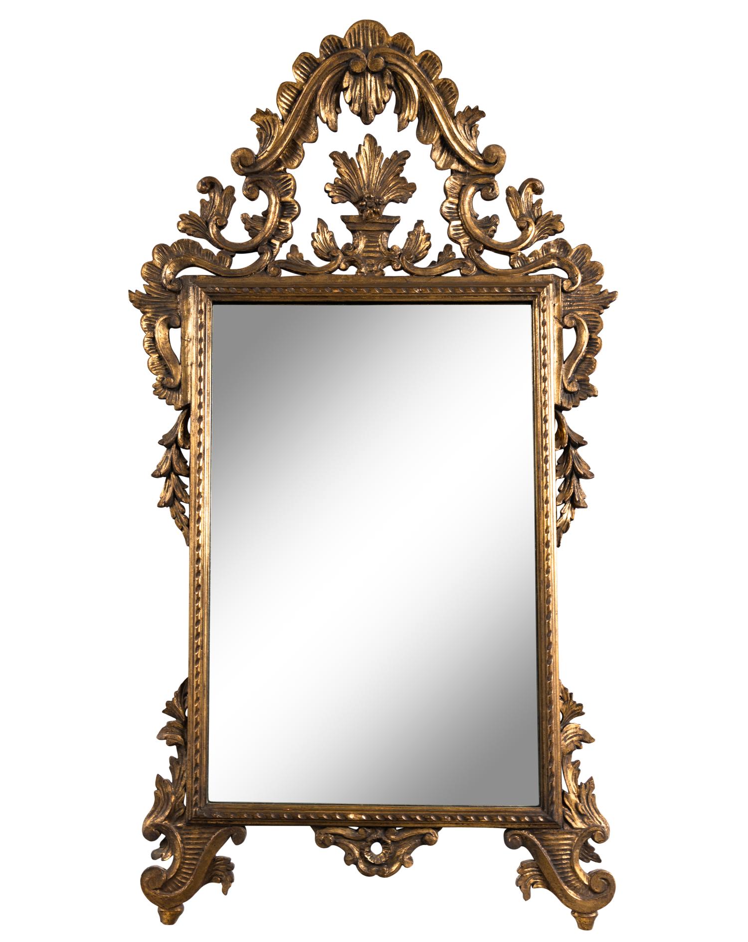 An Italian Baroque Style Giltwood Mirror