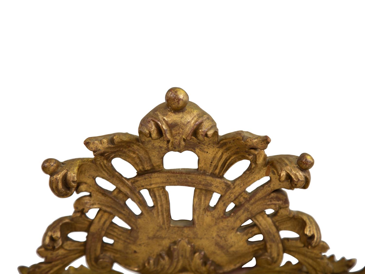An Italian Rococo Style Giltwood Mirror