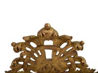An Italian Rococo Style Giltwood Mirror