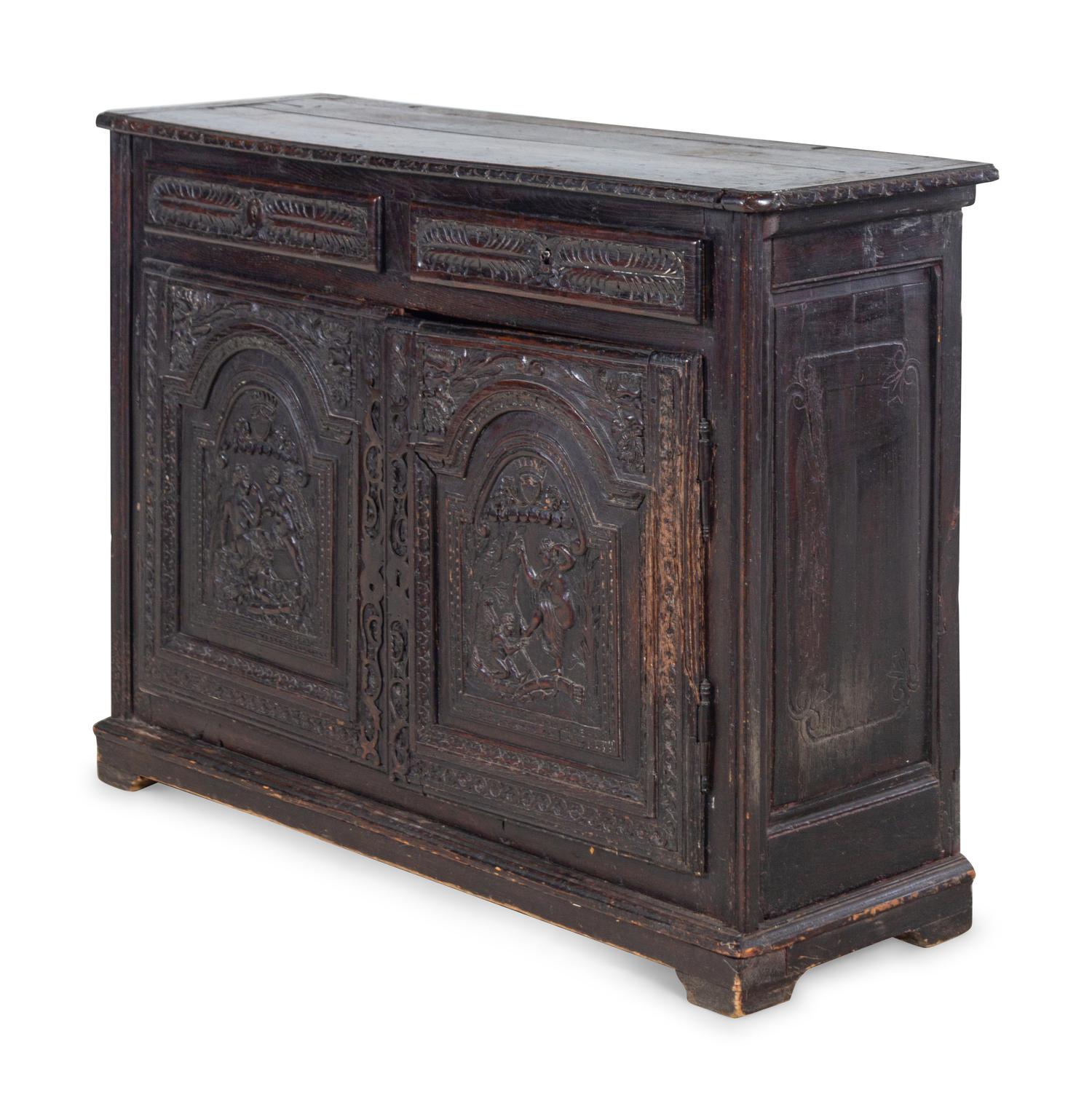 A Renaissance Style Carved Walnut Cabinet
