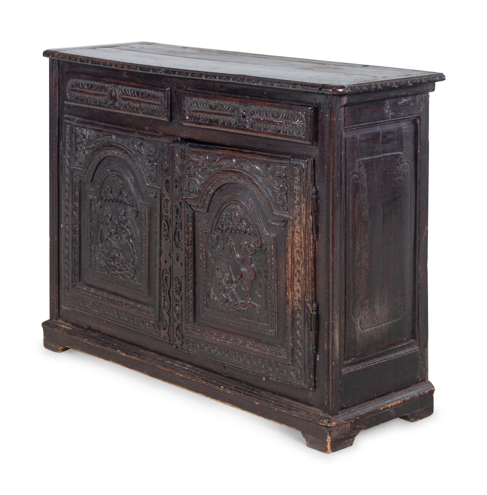 A Renaissance Style Carved Walnut Cabinet