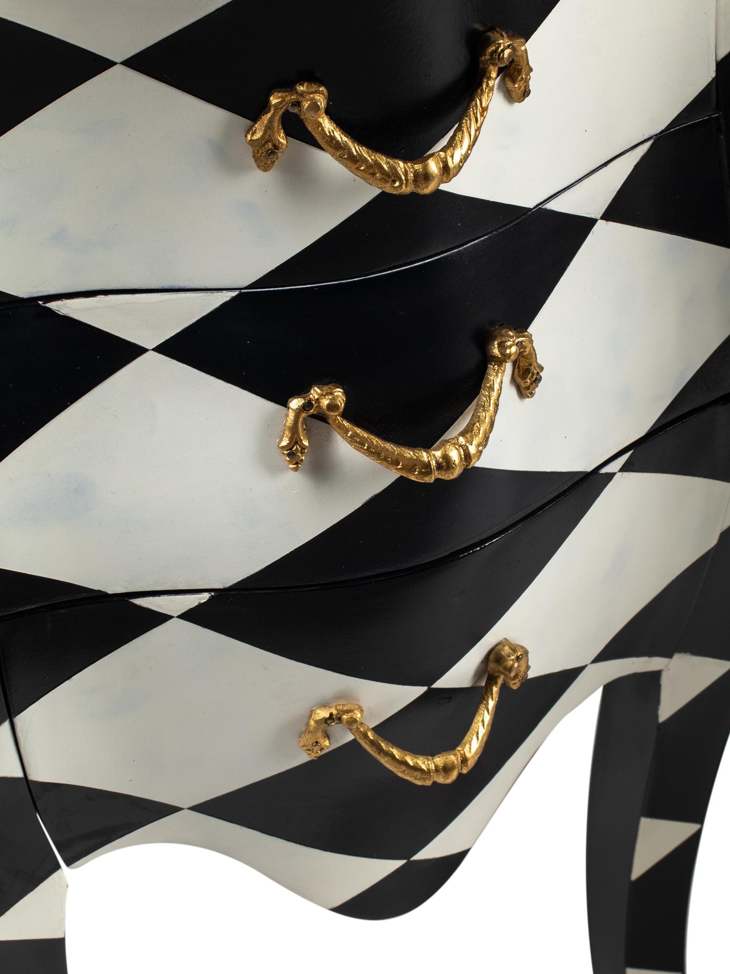 A Pair of Black and White Painted Small Commodes