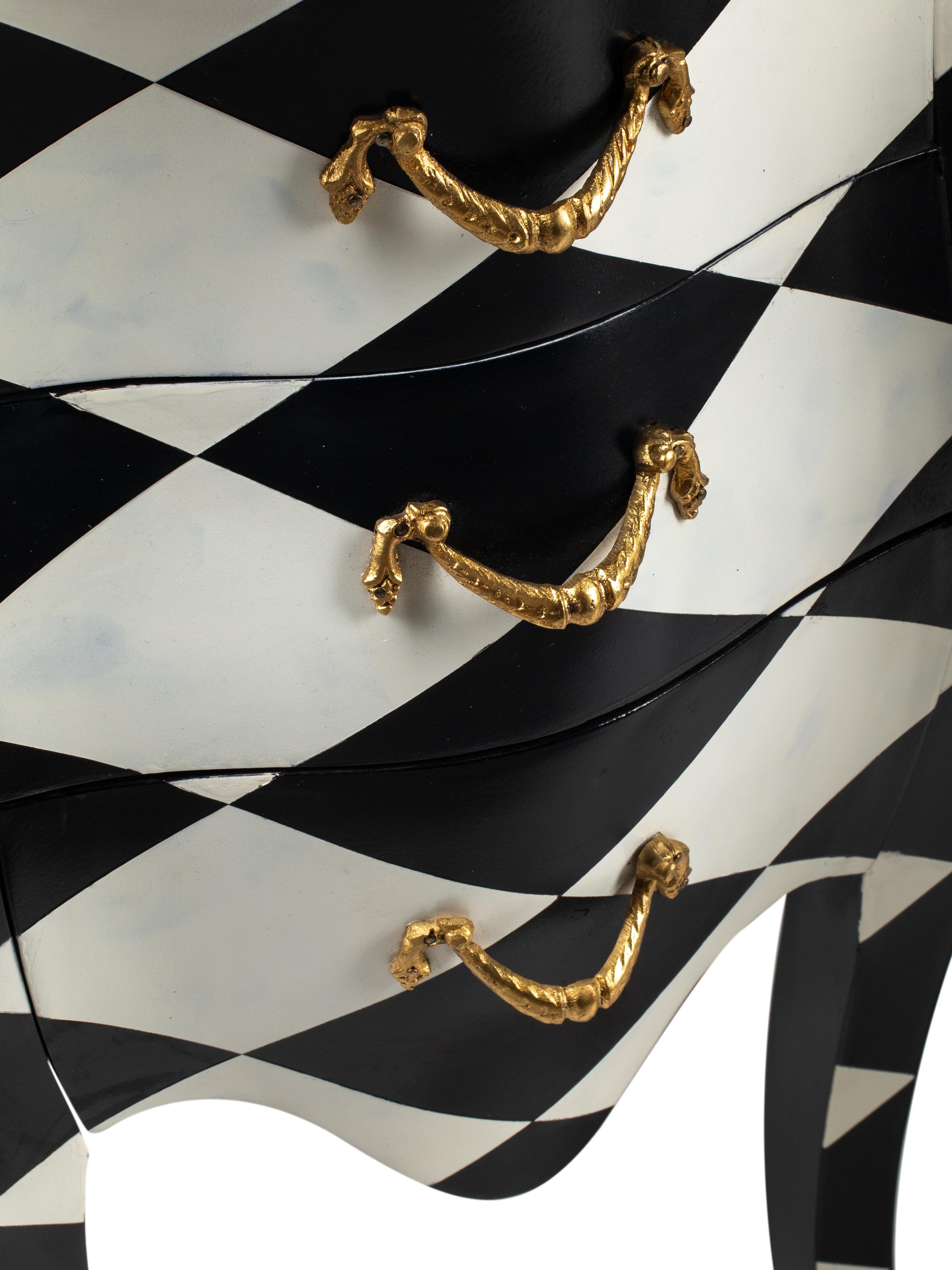 A Pair of Black and White Painted Small Commodes