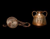 An African Metalwork Pendant and Copper Jar
