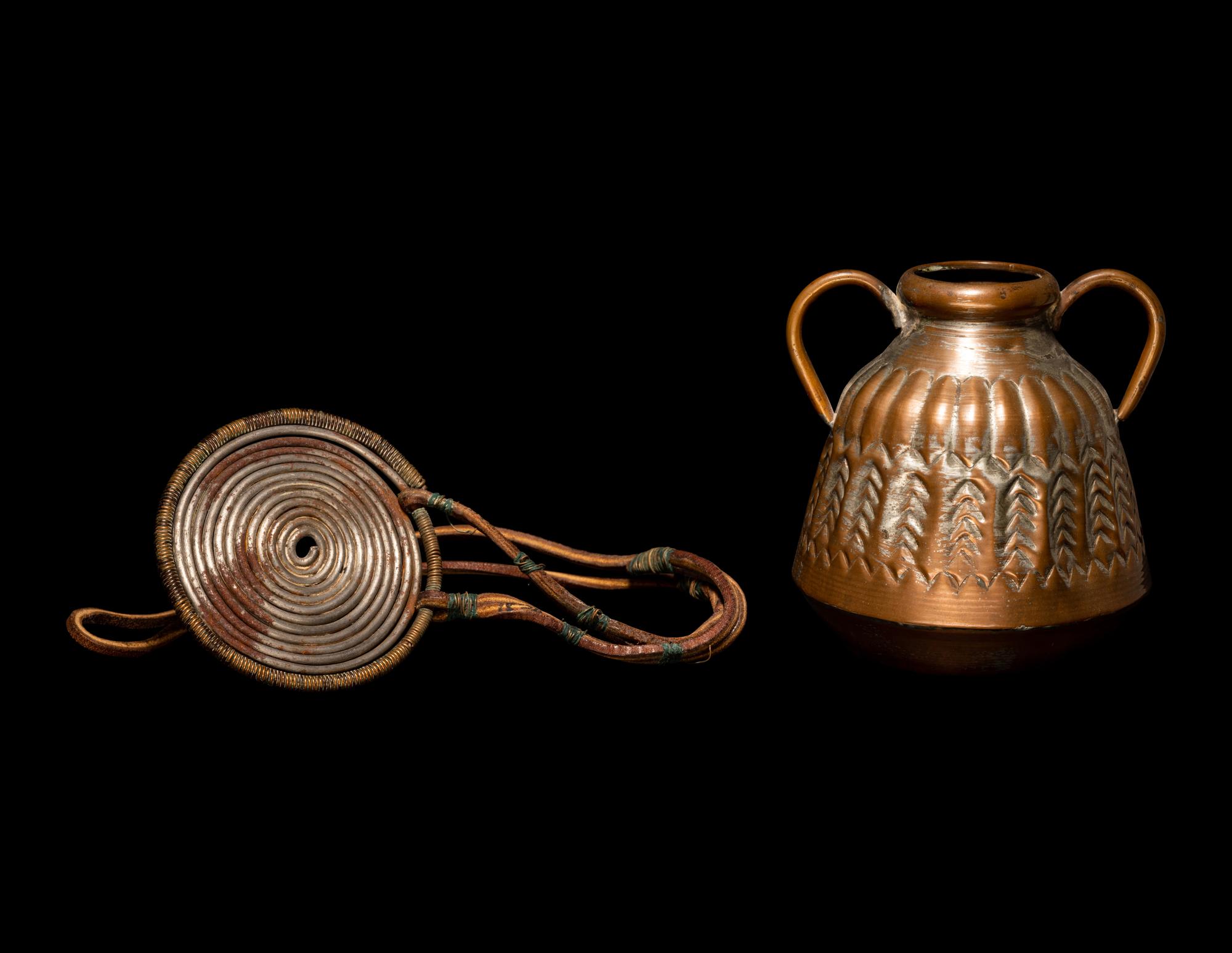 An African Metalwork Pendant and Copper Jar