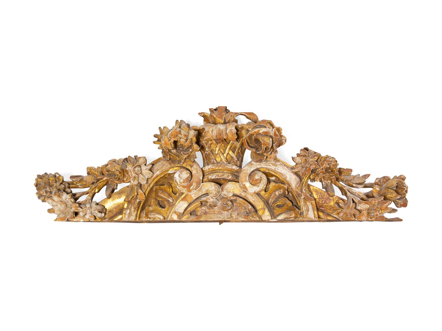 A Continental Carved Giltwood Overdoor Panel