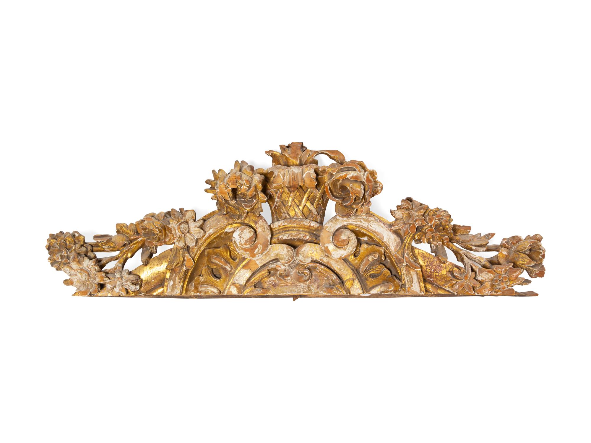 A Continental Carved Giltwood Overdoor Panel