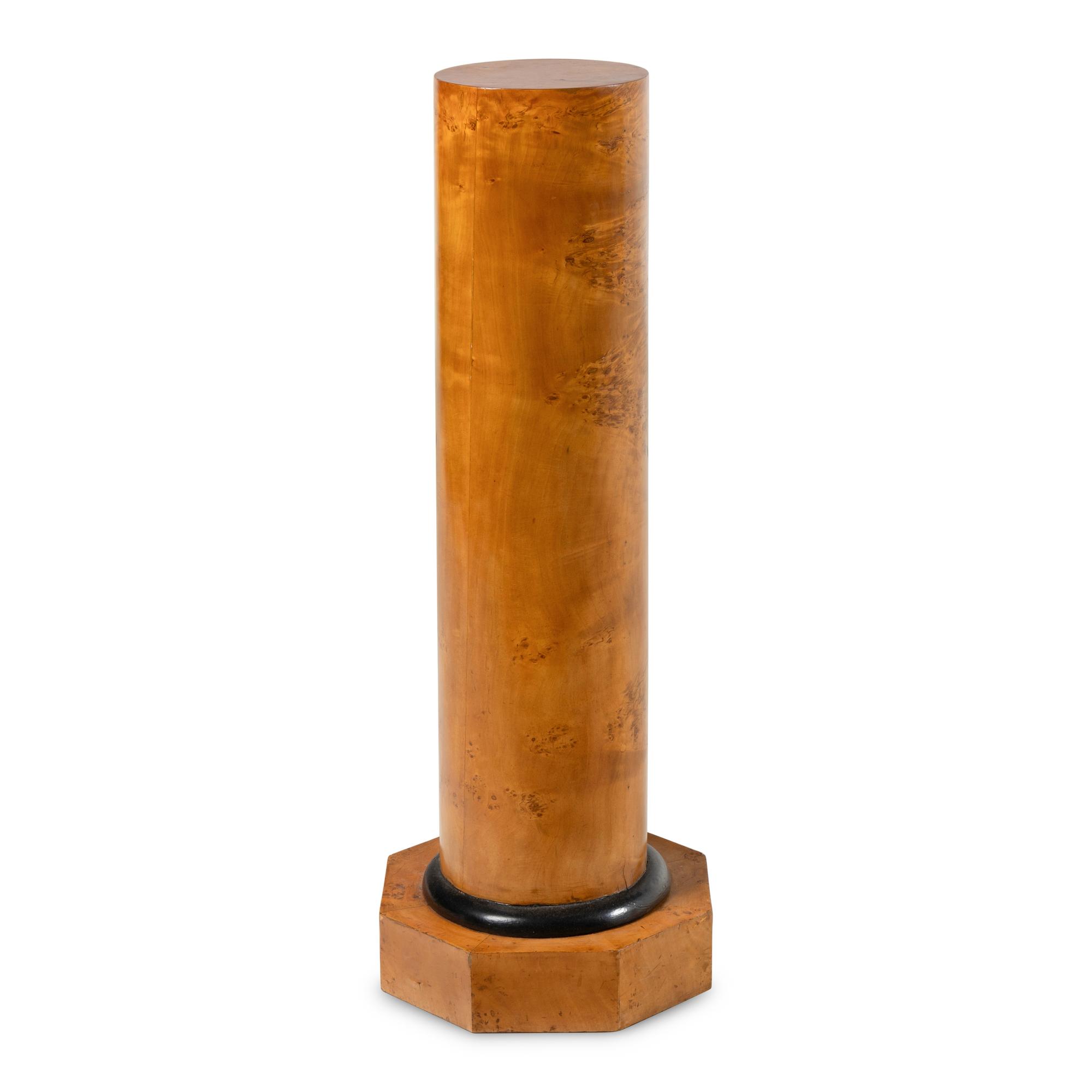 A Biedermeier Karelian Birch and Ebonized Pedestal