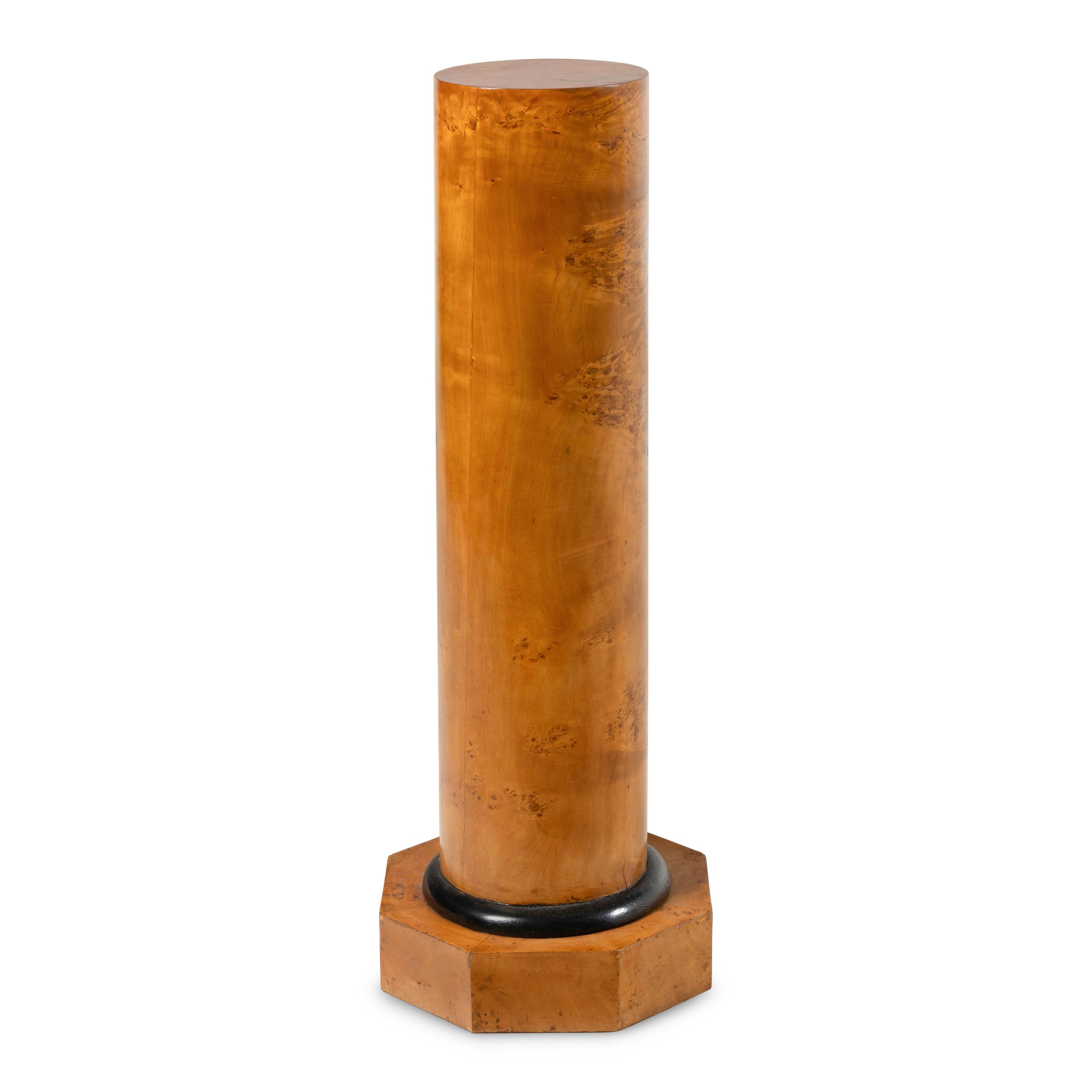 A Biedermeier Karelian Birch and Ebonized Pedestal