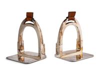 A Pair of Ralph Lauren Silver-Plate and Leather Stirrup-Form Bookends